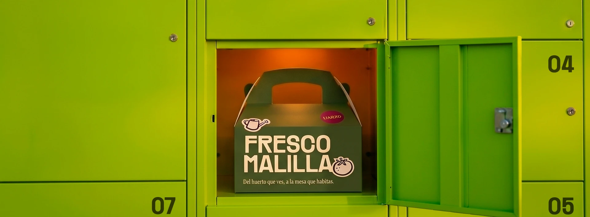 A Fresco Malilla vegetable box inside an open lime-green collection locker.