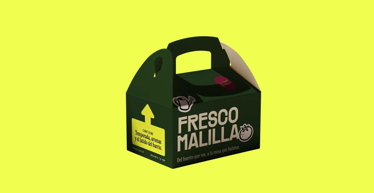 Dark green Fresco Malilla vegetable box with illustrated produce stickers on a lime background.