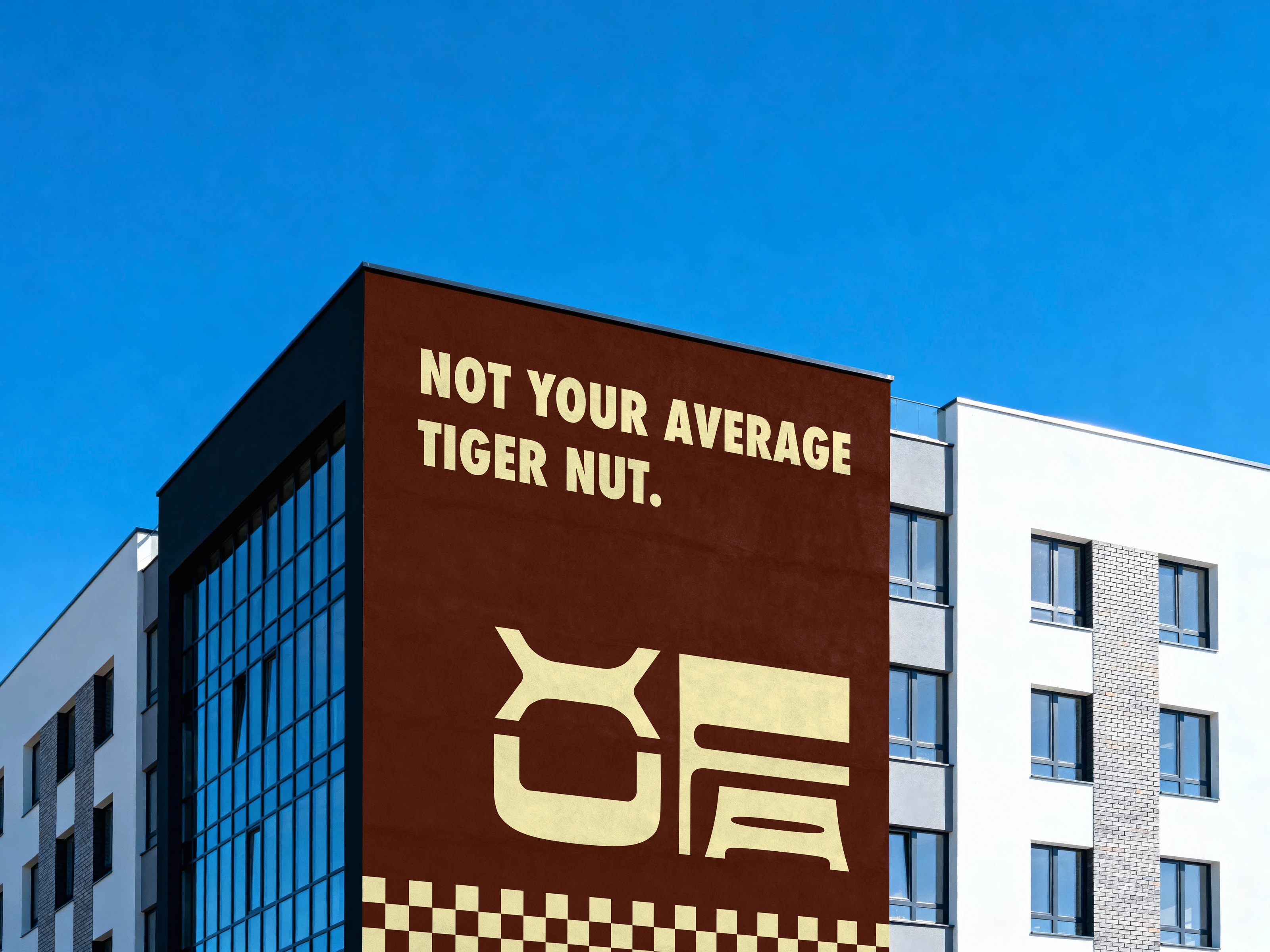 Xufa facade billboard reading Not your average tiger nut drink against a bright blue sky.